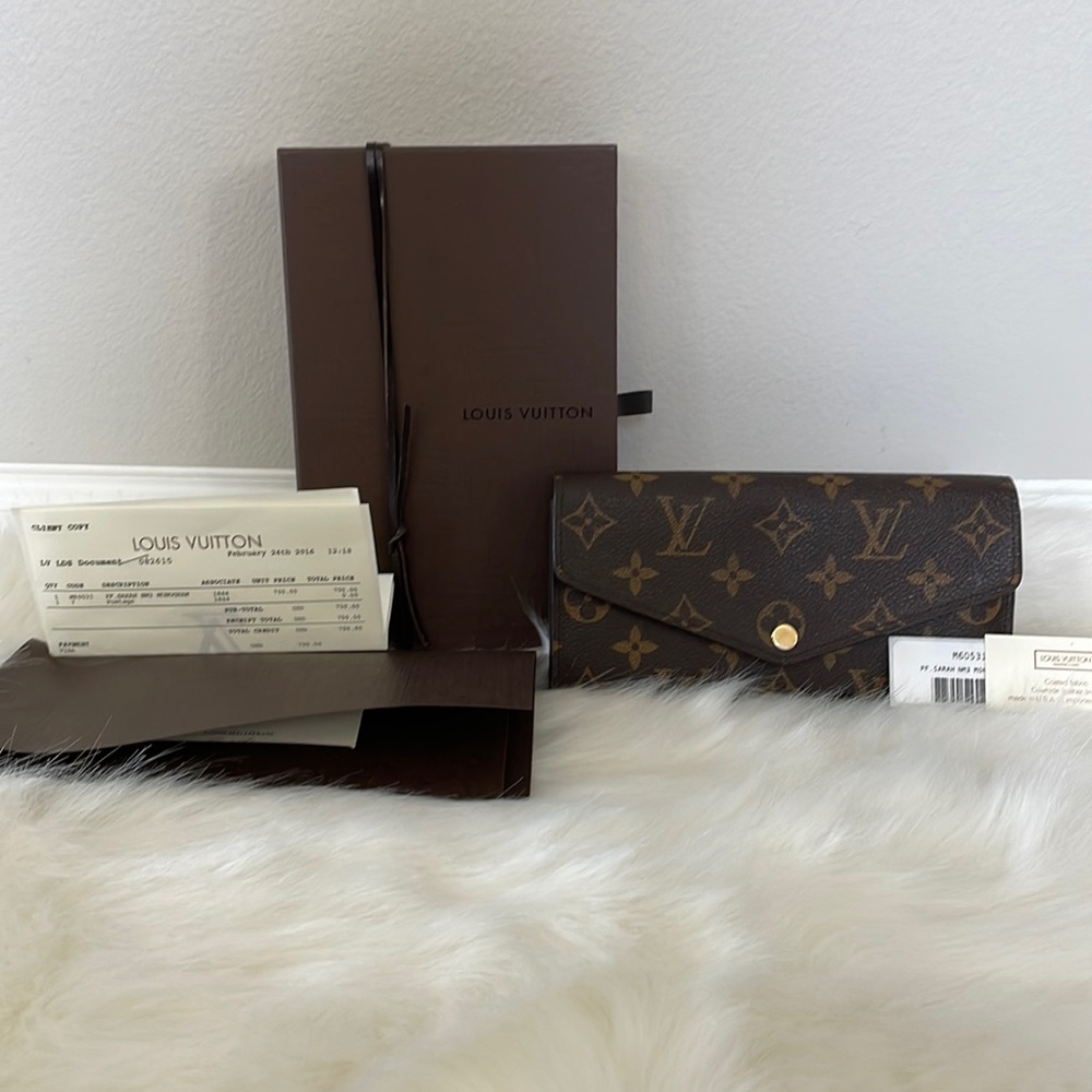 100 percent authentic Louis Vuitton Sarah wallet